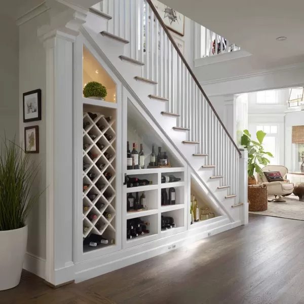 Built in wine rack under stairs